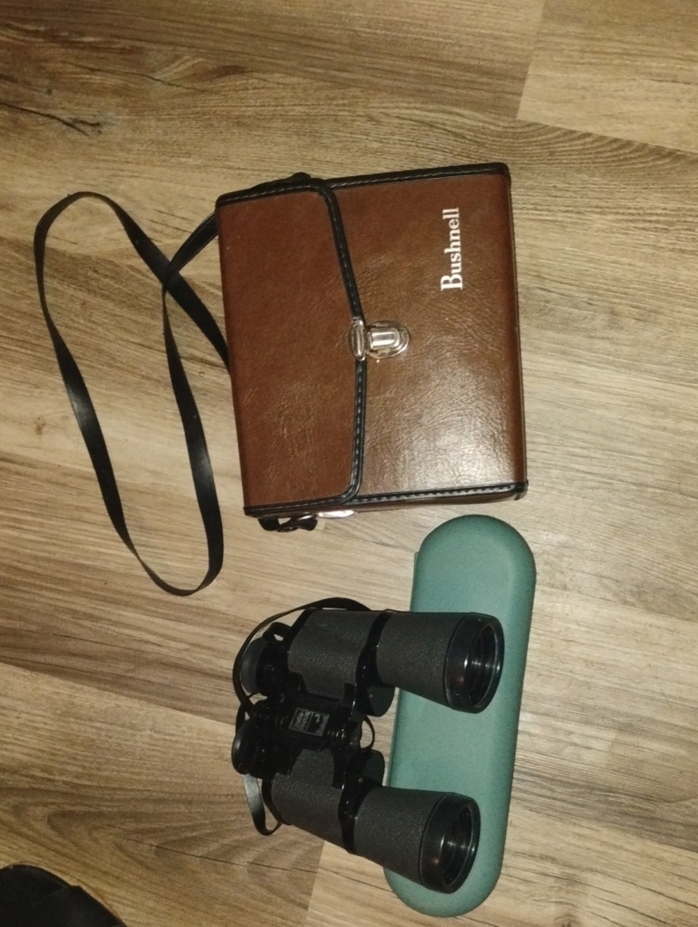 Bushnell Binoculars and Brown Leather Binocular Case with Black Strap